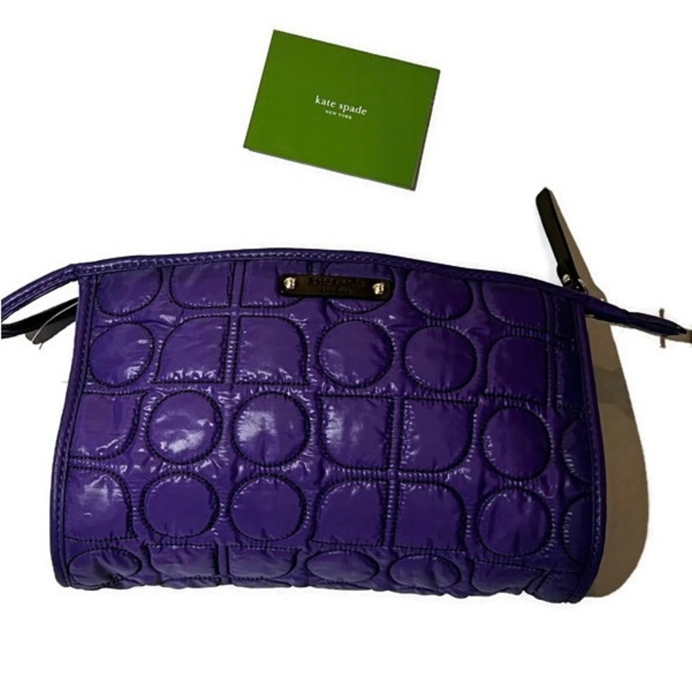 NWT Kate Spade purple quilted makeup bag with water resistant lining.